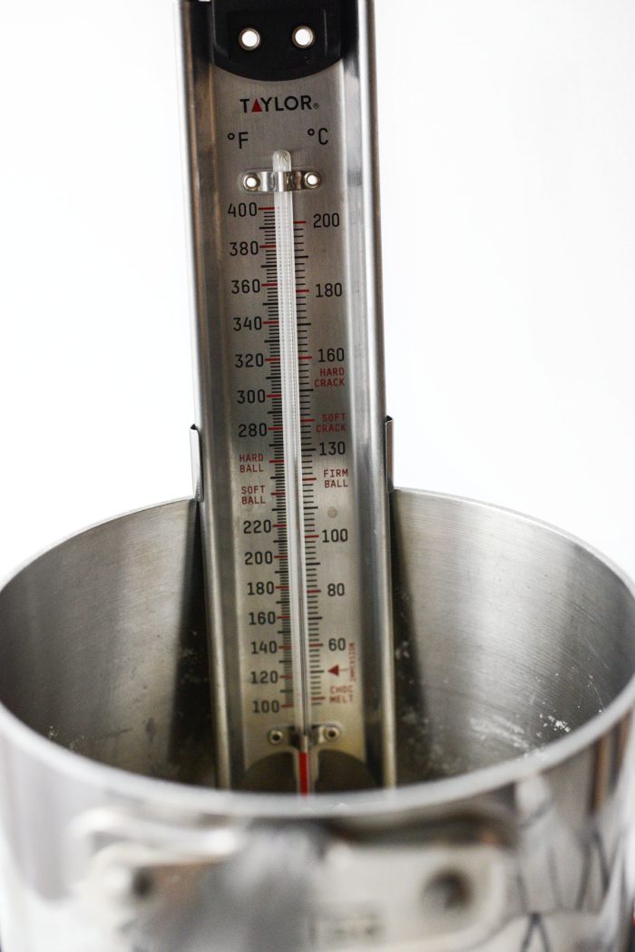 attach candy thermometer to saucepan