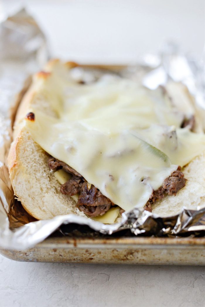 melted cheese on steak sandwiches