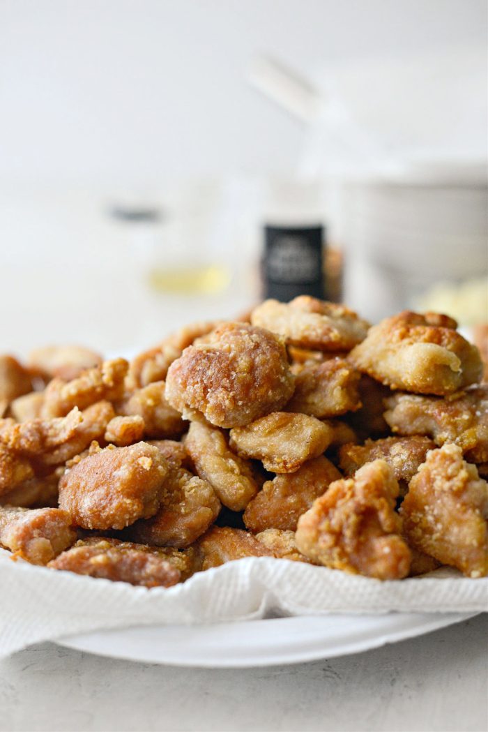 cooked chicken on lined plate