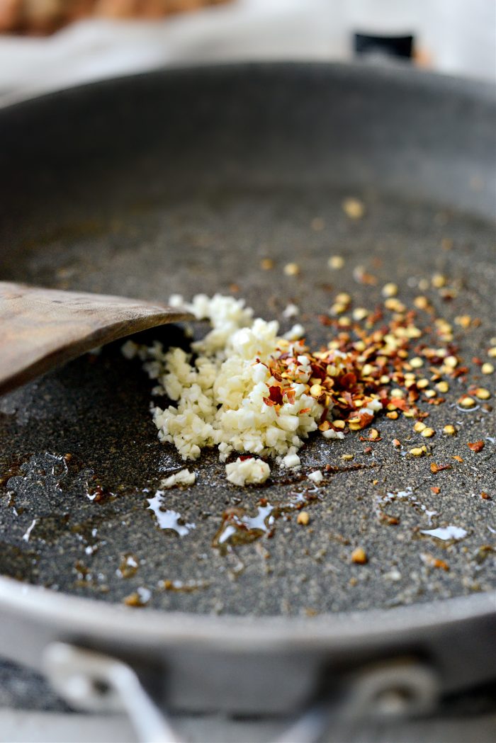 add oil, garlic and red pepper flakes