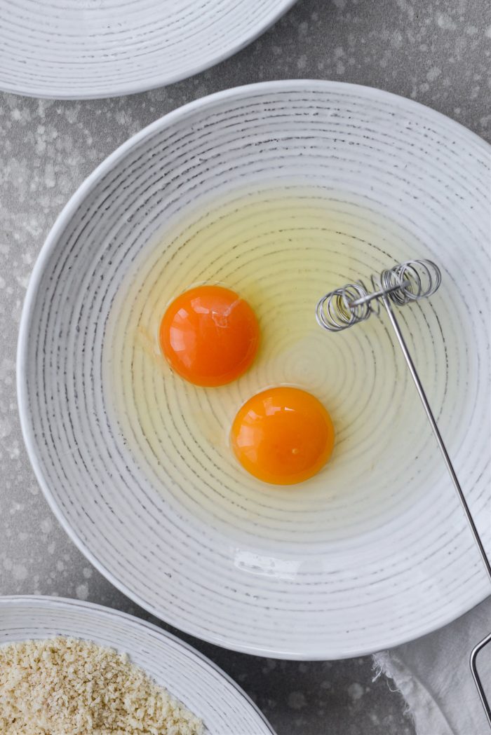 crack eggs in a bowl