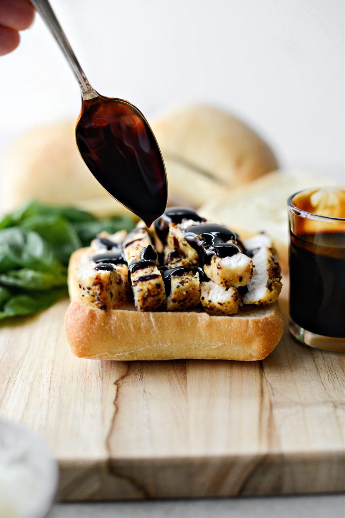 Top ciabatta with chicken and balsamic glaze