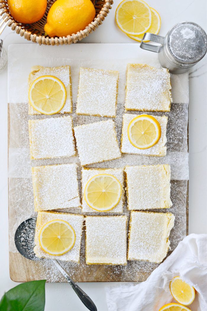 dust Meyer Lemon Bars with powdered sugar