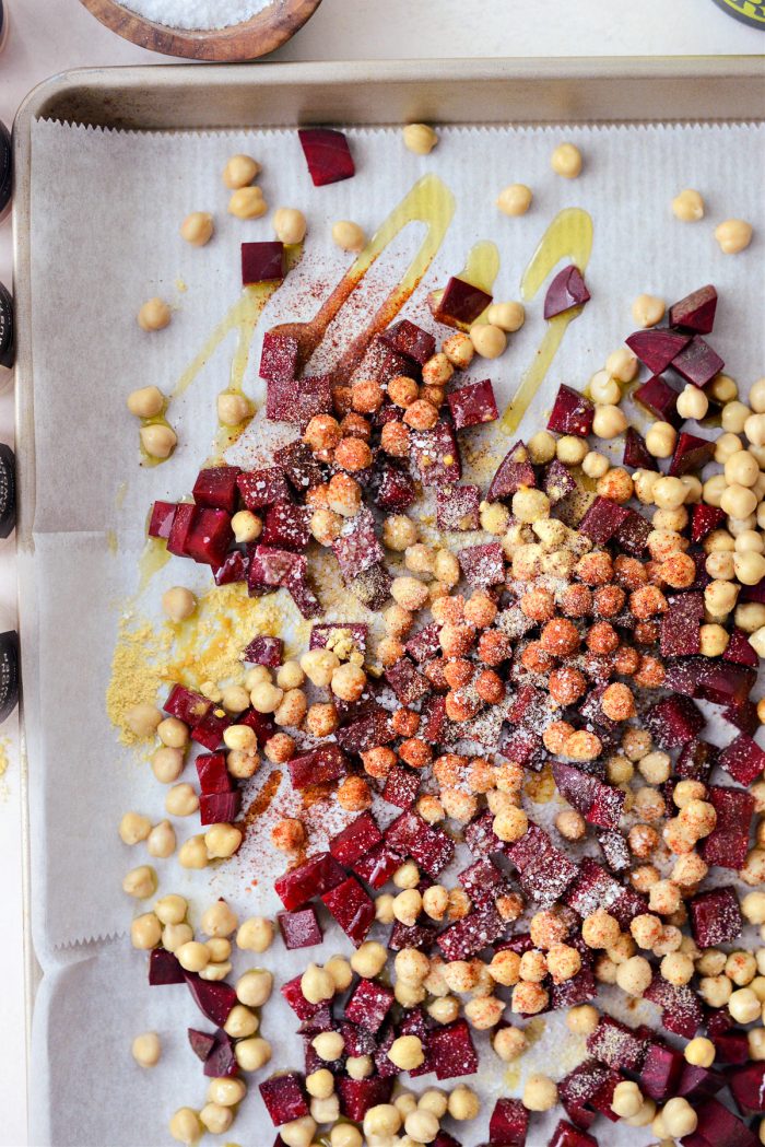 diced beets, chickpeas, oil and spices on sheet pan