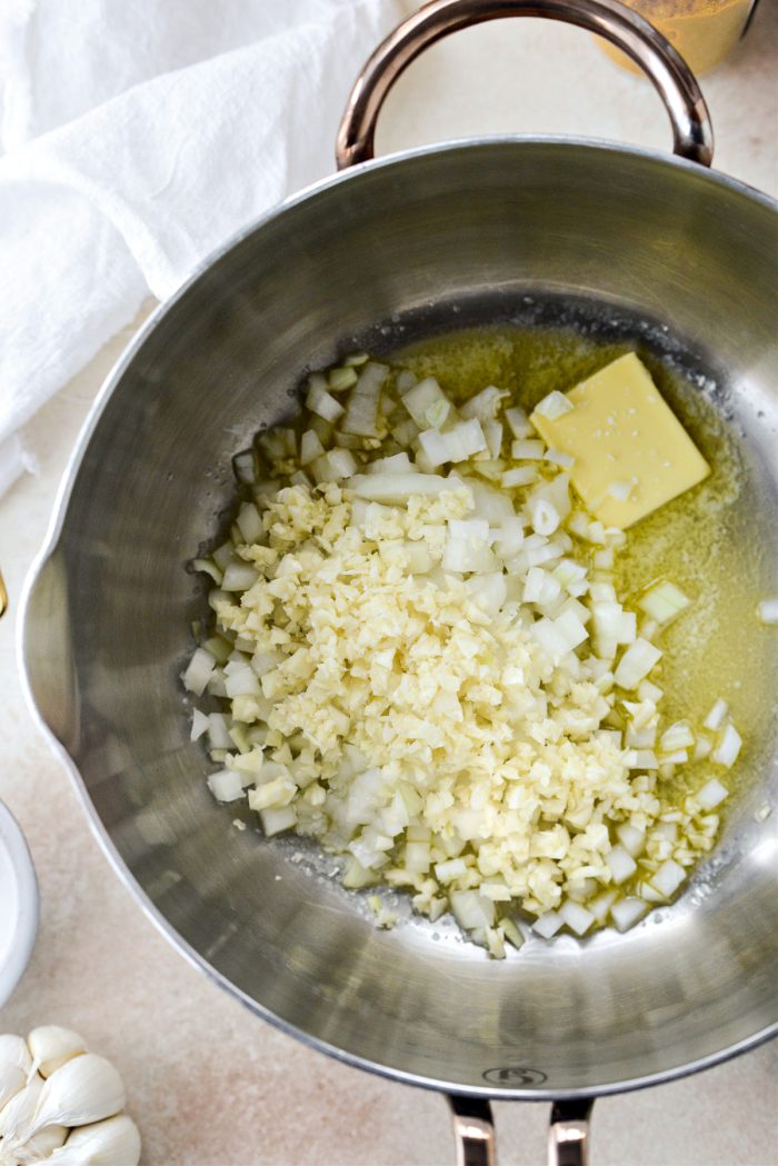 Sauté onions and garlic in butter
