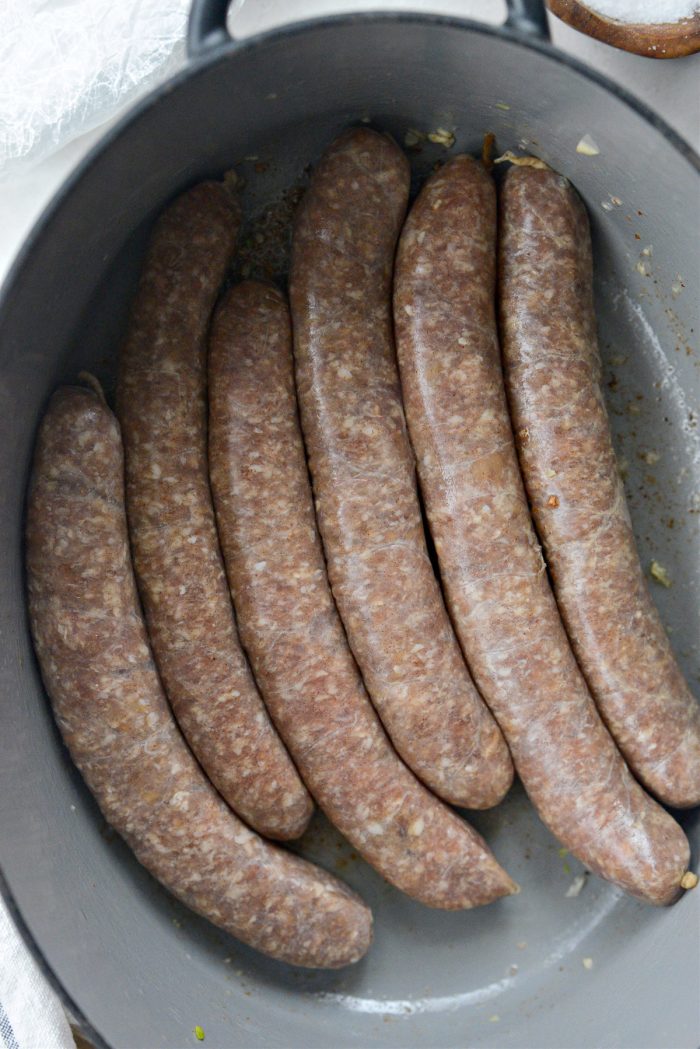add sausages to fat in pan.
