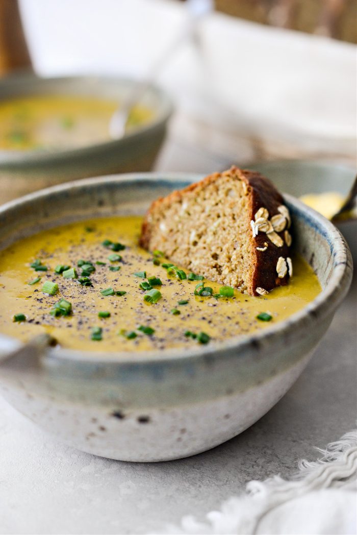 bowl of Irish Vegetable Soup with a slice of Irish brown bread.