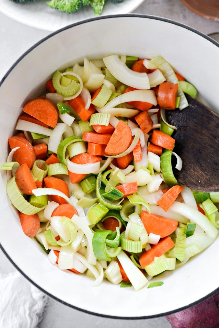 stir and coat vegetables in butter and oil