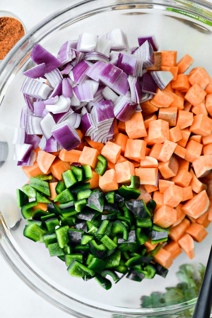 diced sweet potatoes, poblano and onion in bowl