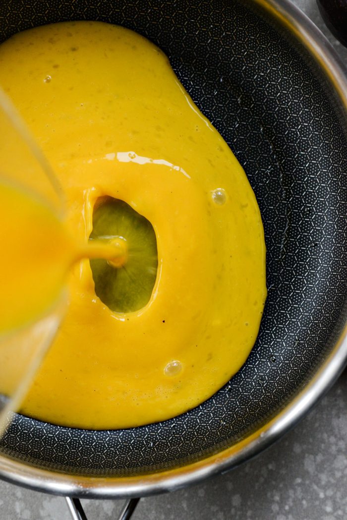 pour eggs into prepared pan