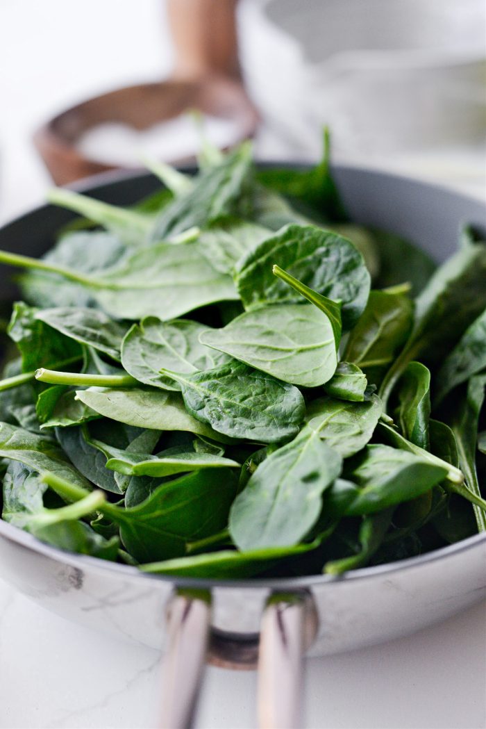 adding spinach