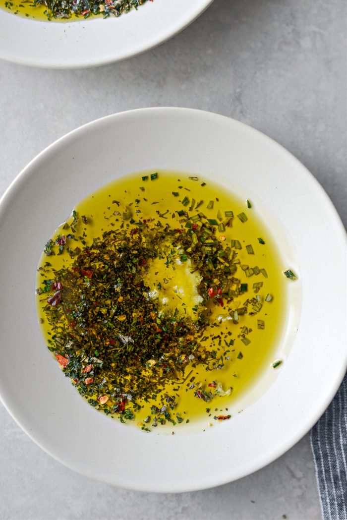 plate with garlic, rosemary and dried herbs and spices