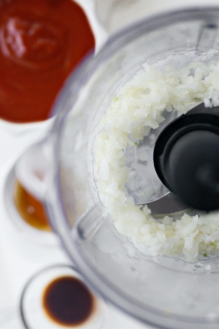 finely chop onion in food processor.