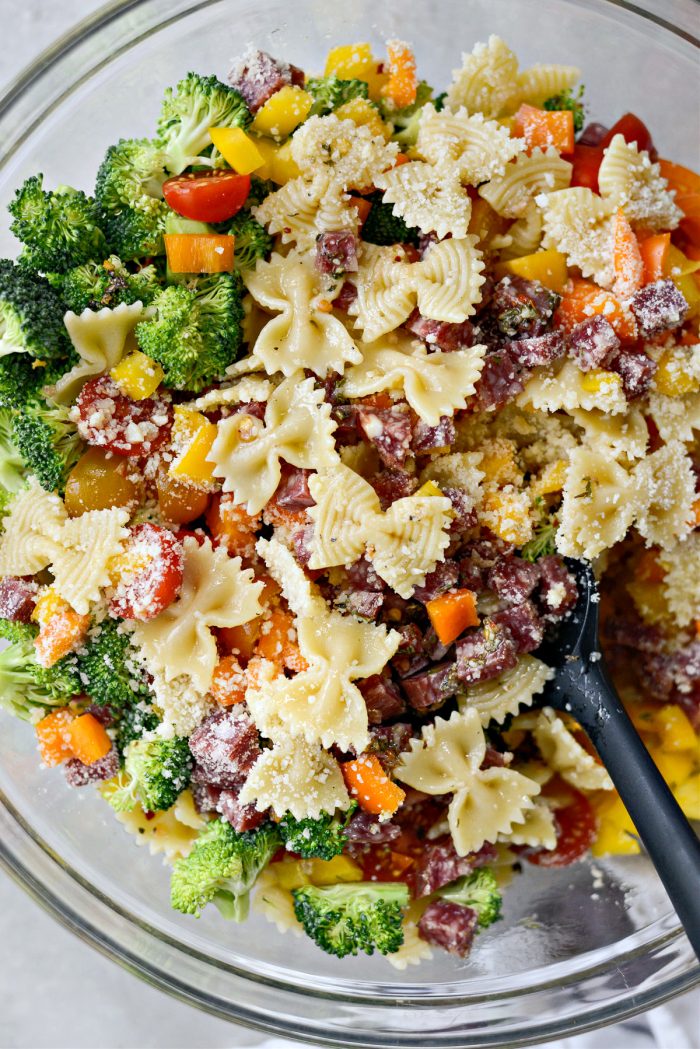 toss pasta salad with dressing