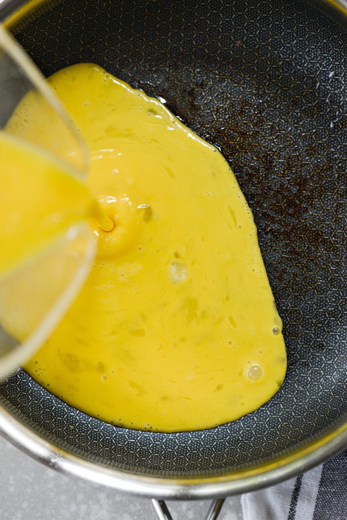 pour in eggs into pan