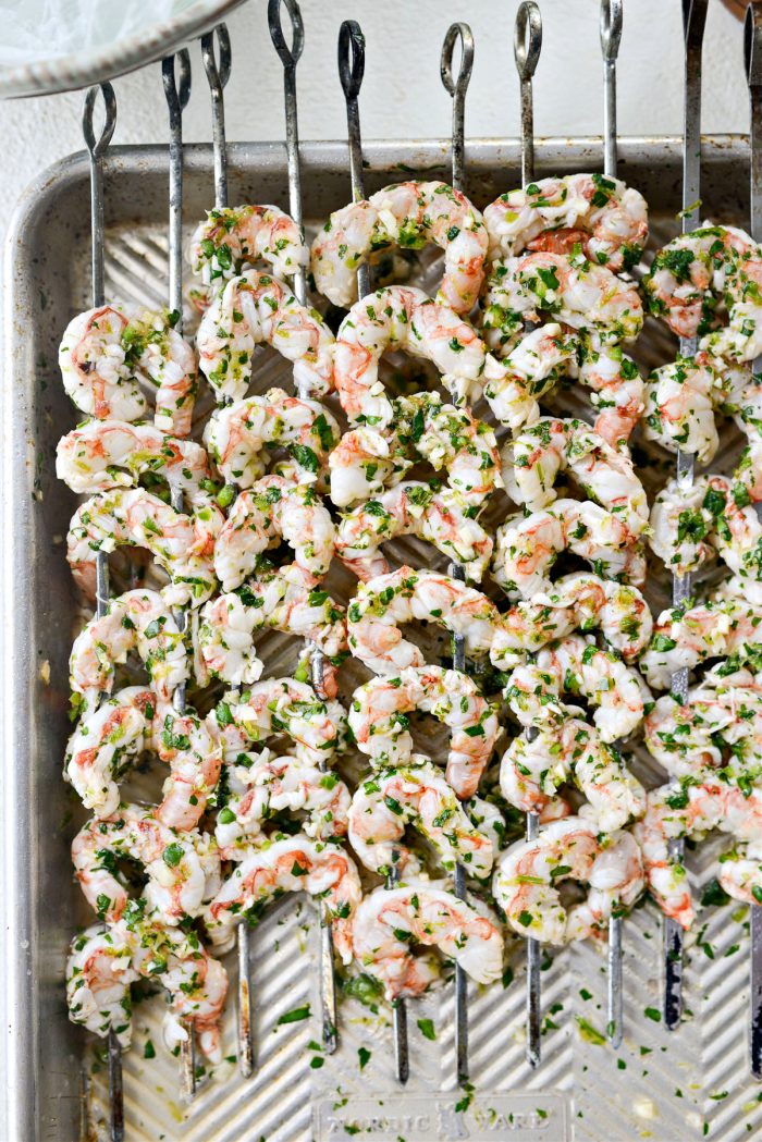 thread shrimp onto skewers