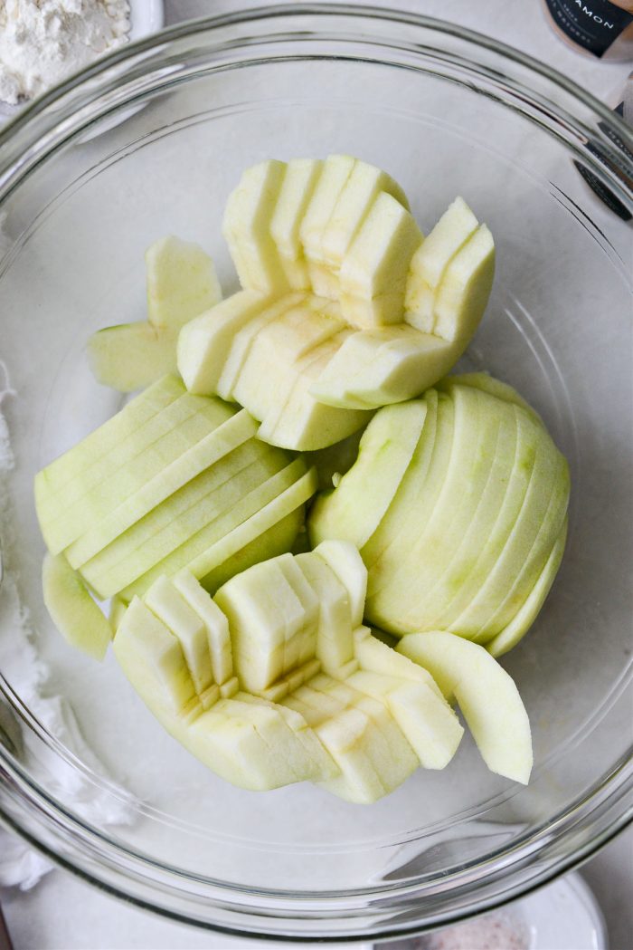 add peeled, cored and sliced apples to a mixing bowl
