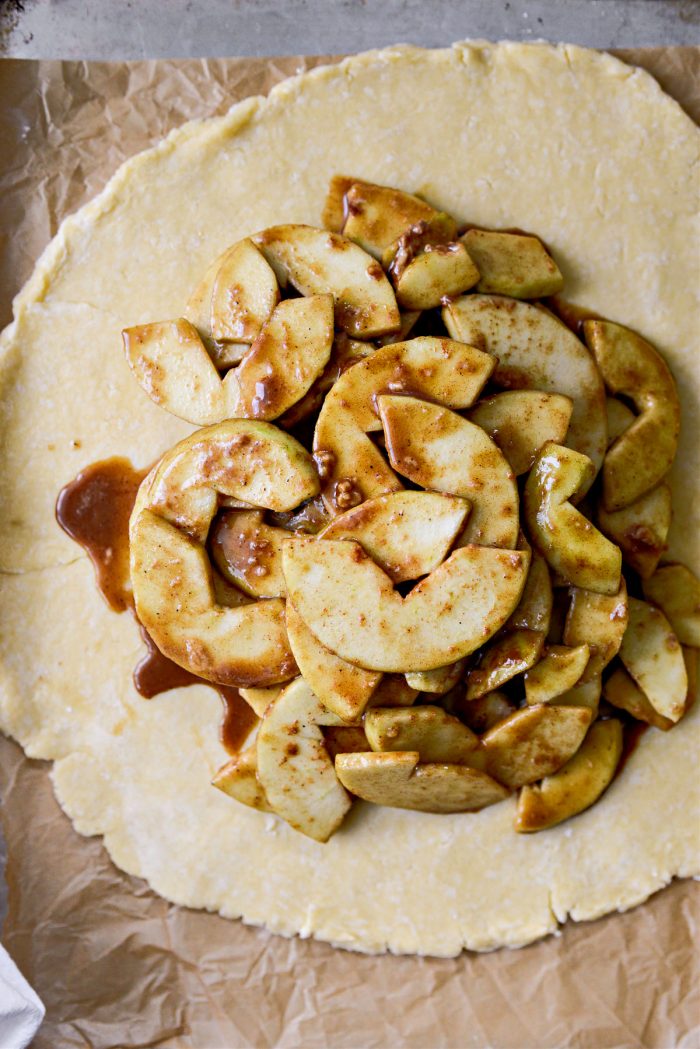 add apple filling to the center of the rolled out dough.