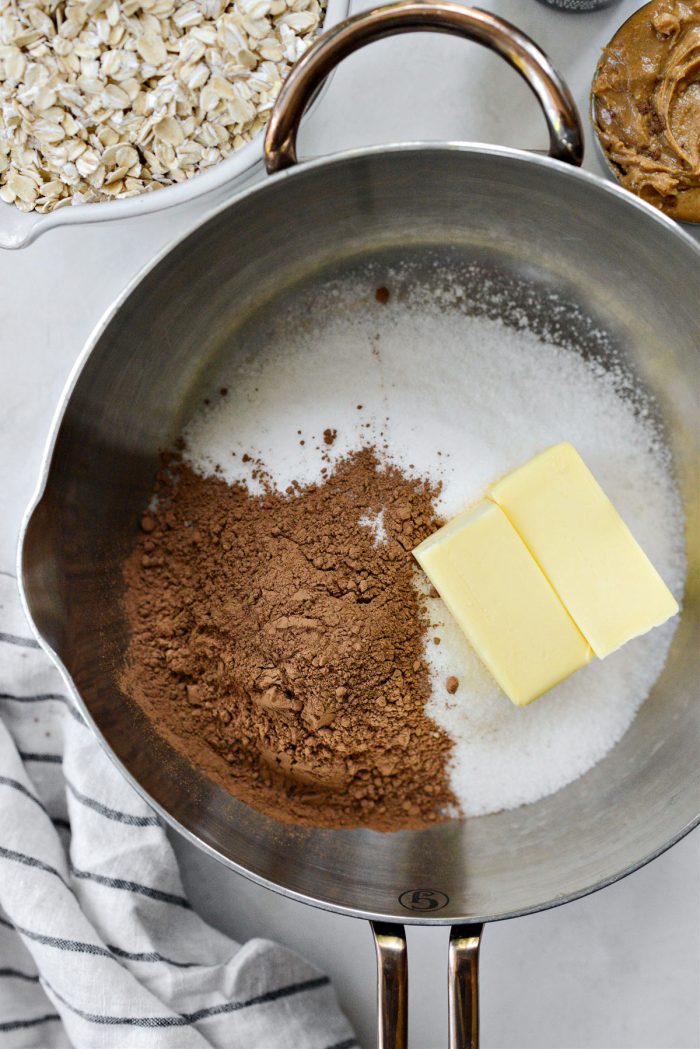 butter, sugar and cocoa powder in saucepan