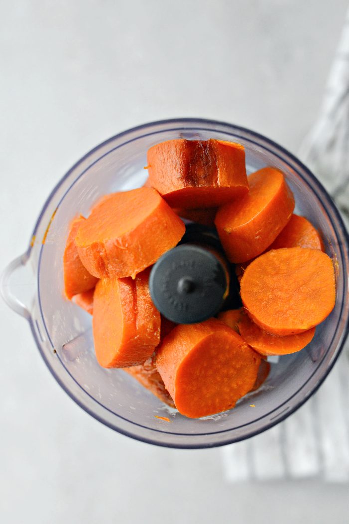 cut sweet potatoes and place into your food processor fitted with the blade attachment.