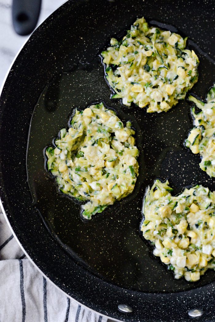 gently press fritters flat