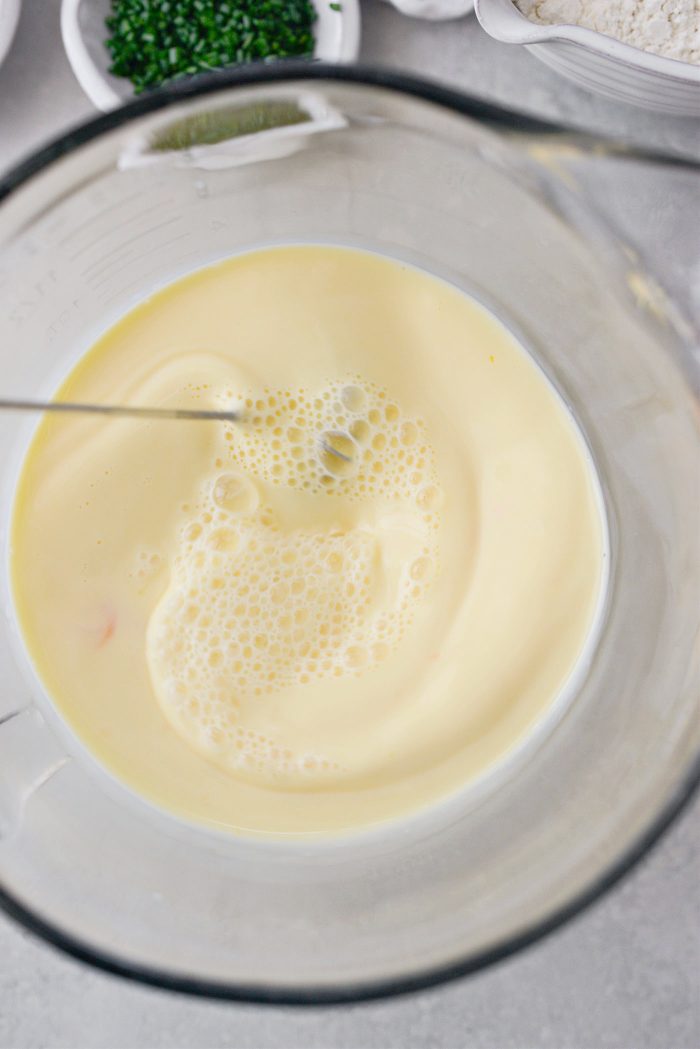 whisk eggs and milk until frothy