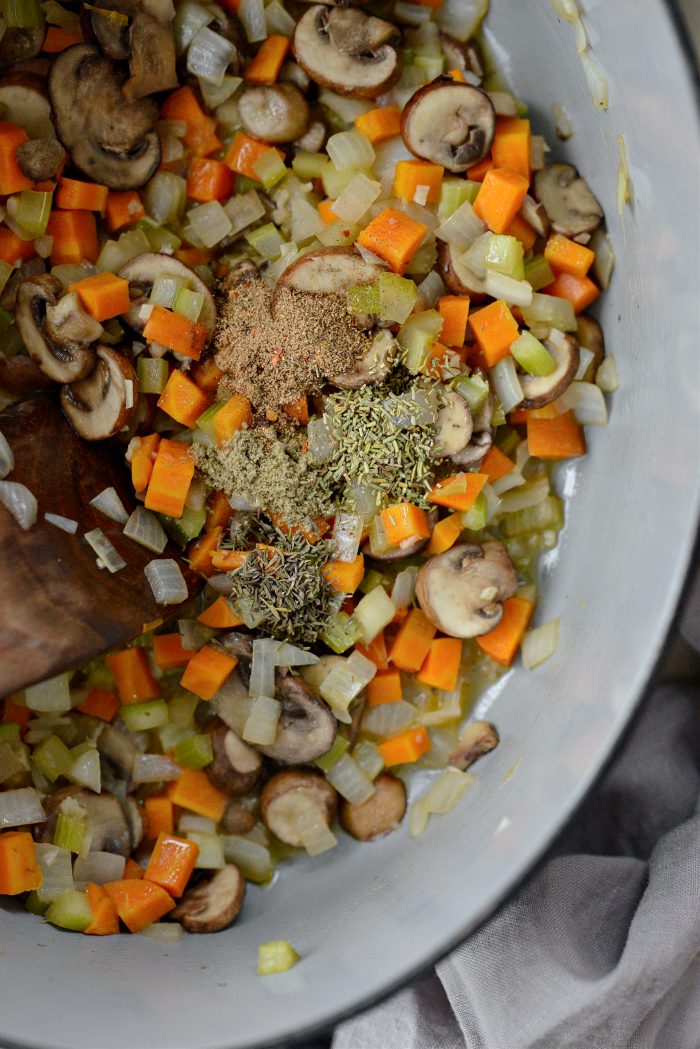Add seasoning and dried herbs