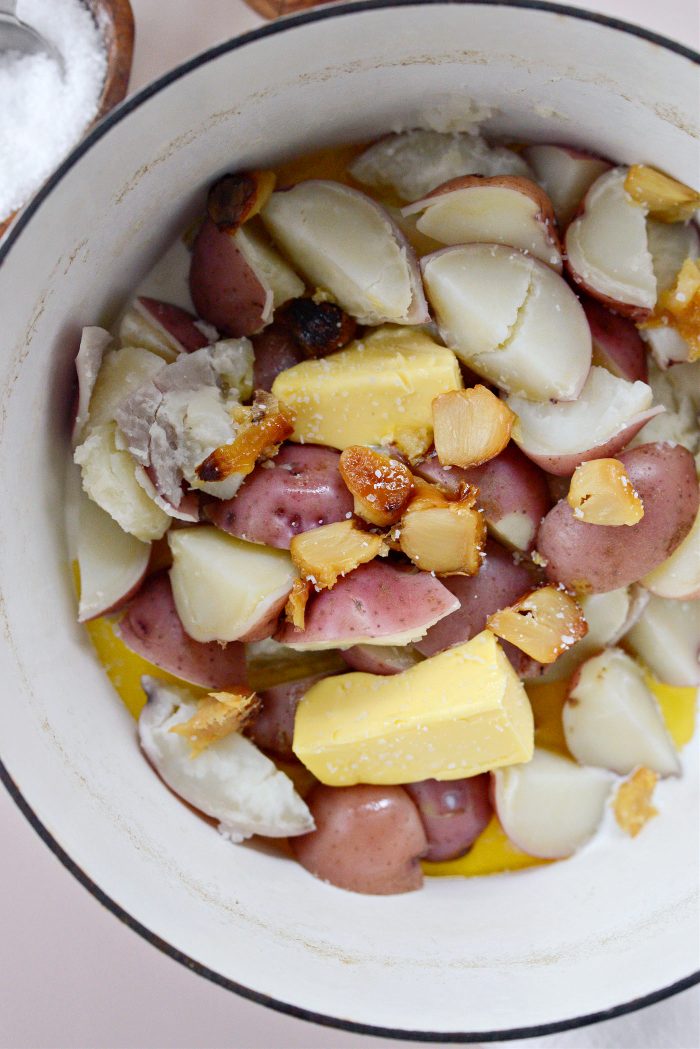 Drain and add half and half, butter, and roasted garlic