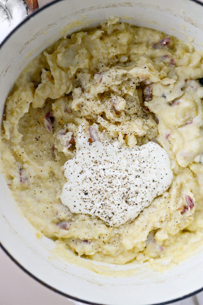 Add sour cream and season with salt and pepper