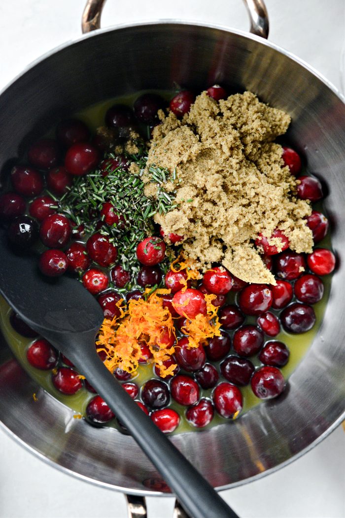 cranberries, orange juice, brown sugar, orange zest and chopped rosemary in saucepan