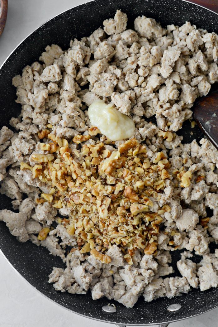 cooked ground chicken, chopped walnuts and garlic paste