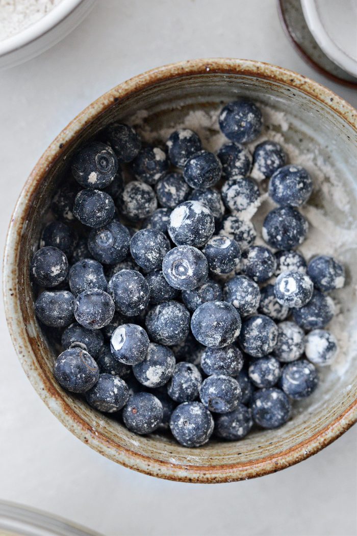toss blueberries with a little of the dry ingredients