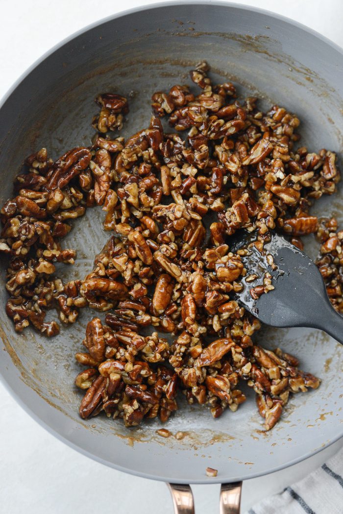 add pecans and stir to coat