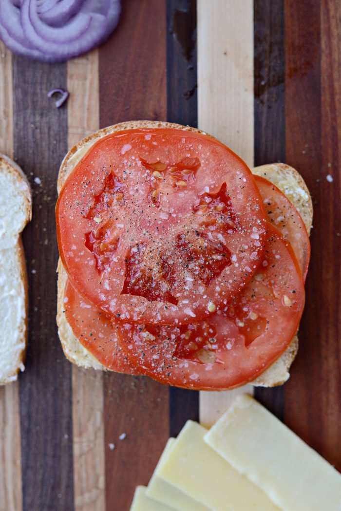 top butter side with tomatoes salt and pepper