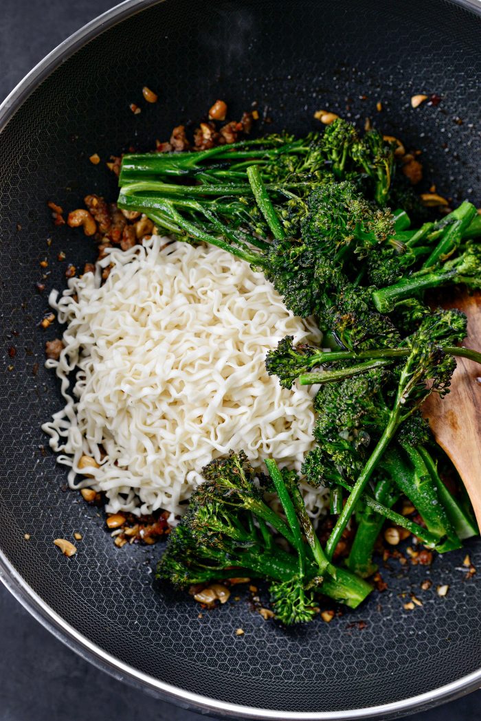 add cooked noodles and roasted broccolini