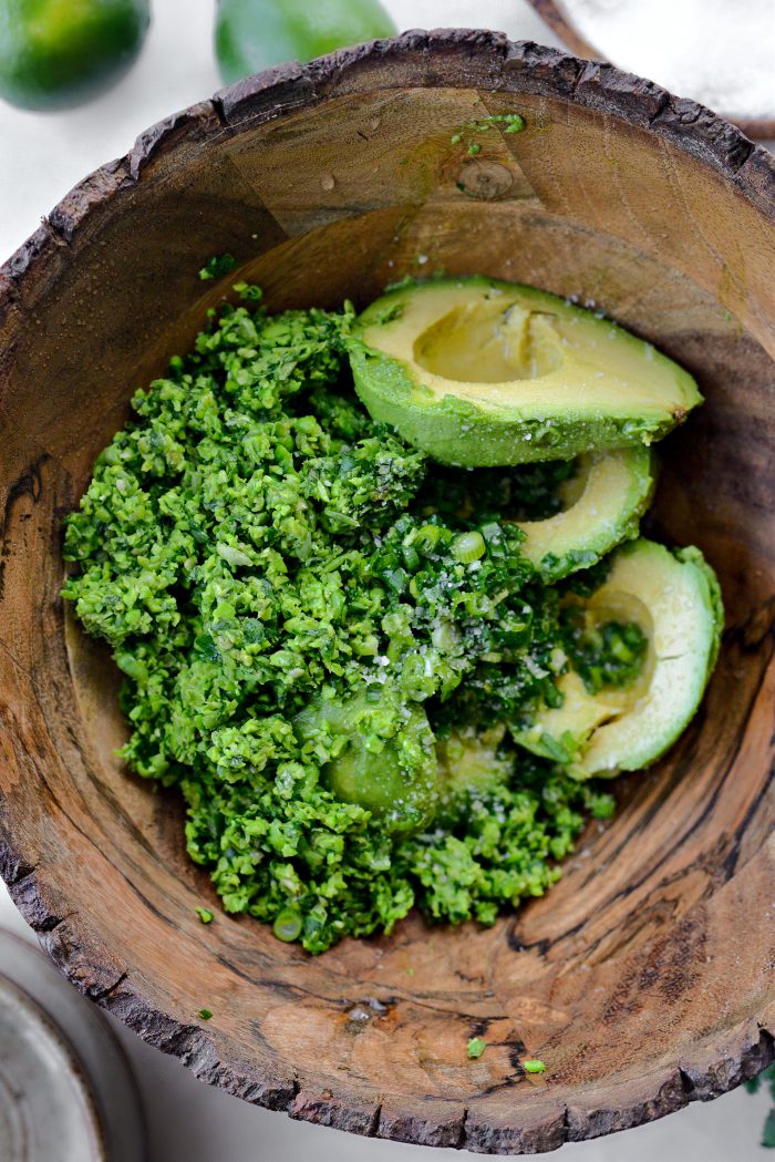 add avocados, lime juice, pea mixture, salt and chopped green onion to a bowl