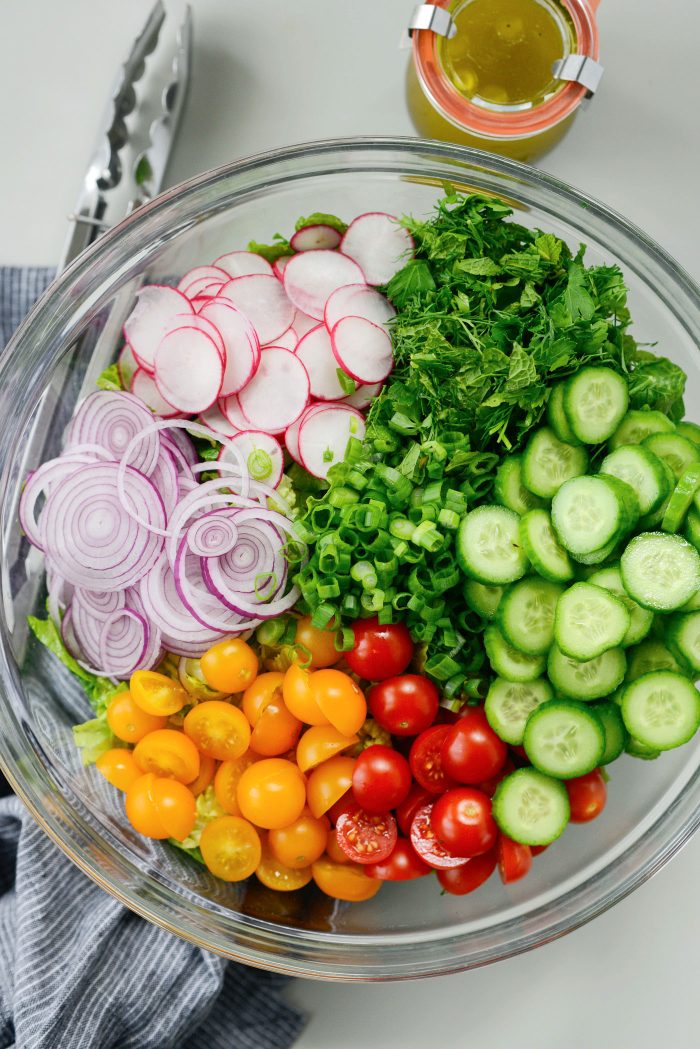 prepped salad ingredients in bowl