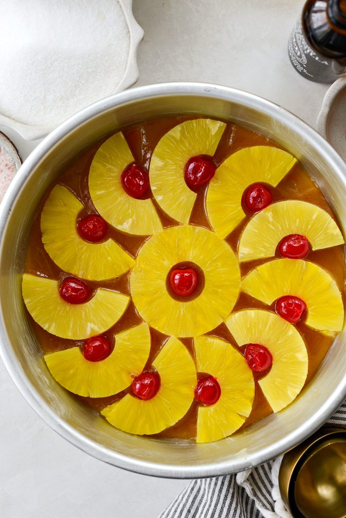 arrange pineapple and cherries