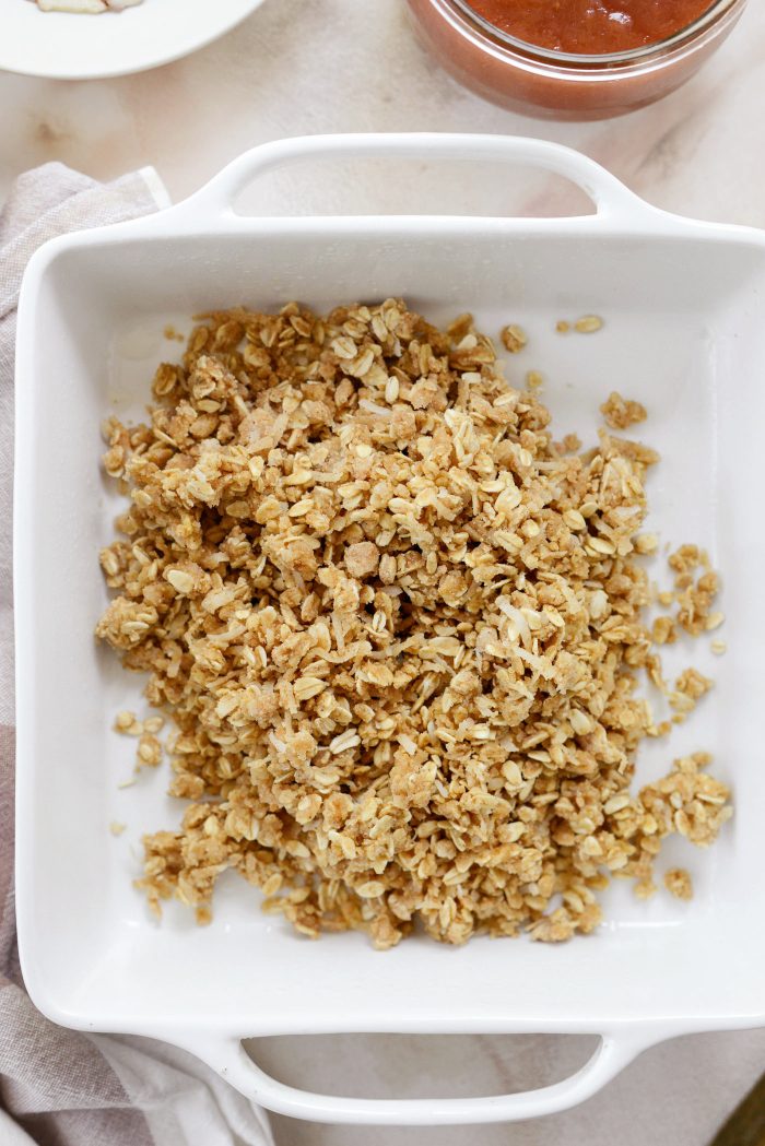 add remaining crumbs to pan