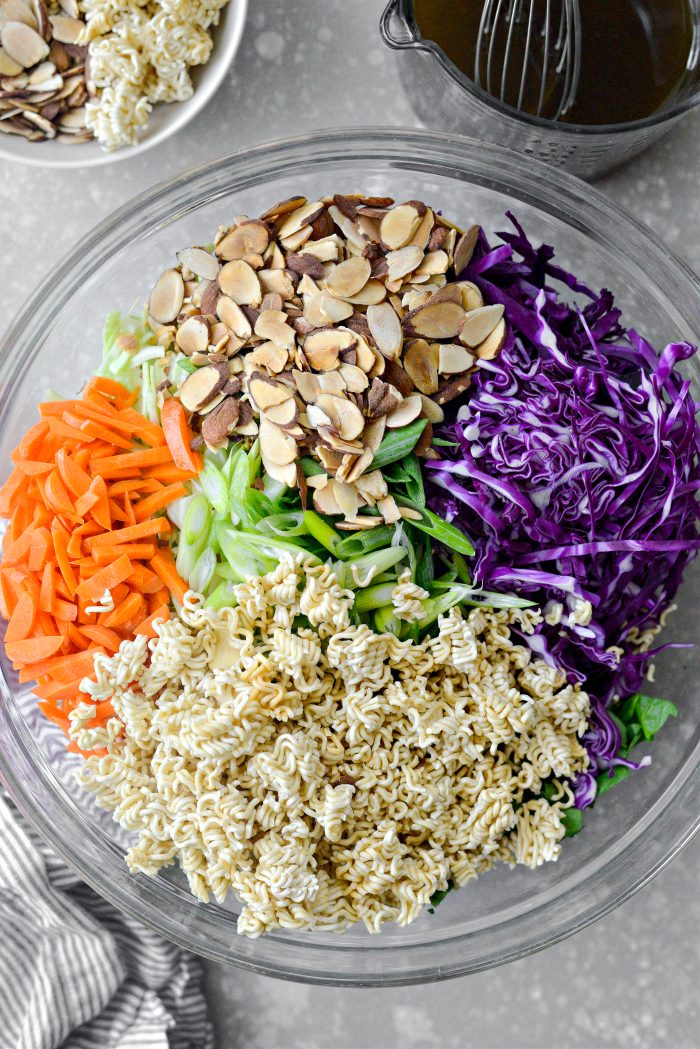 add toasted almonds and ramen to bowl