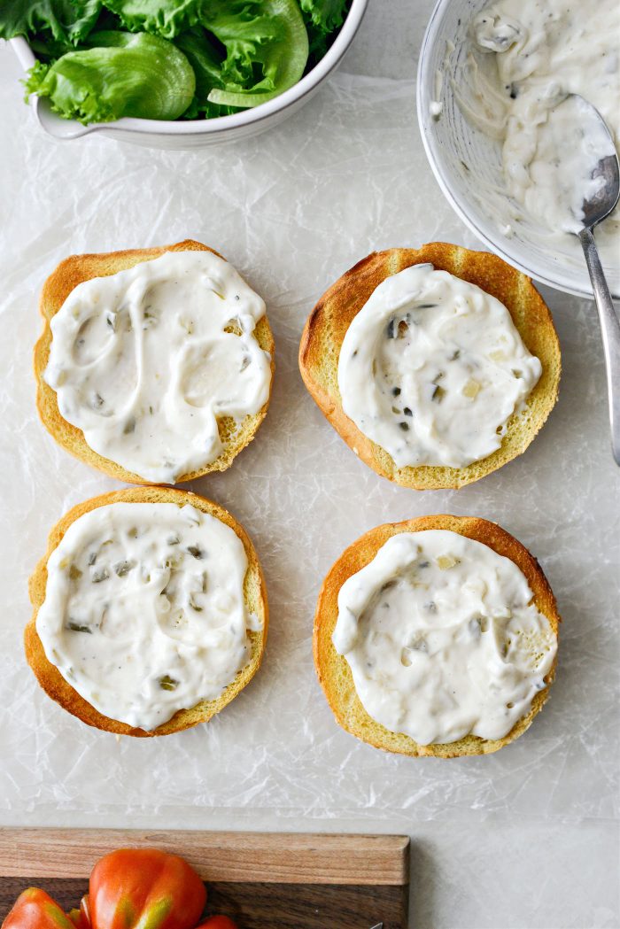 top both sides with tartar sauce