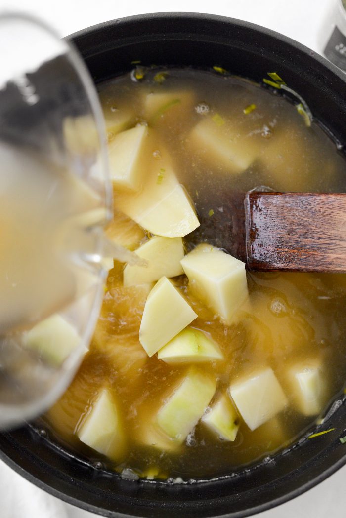 pour in broth