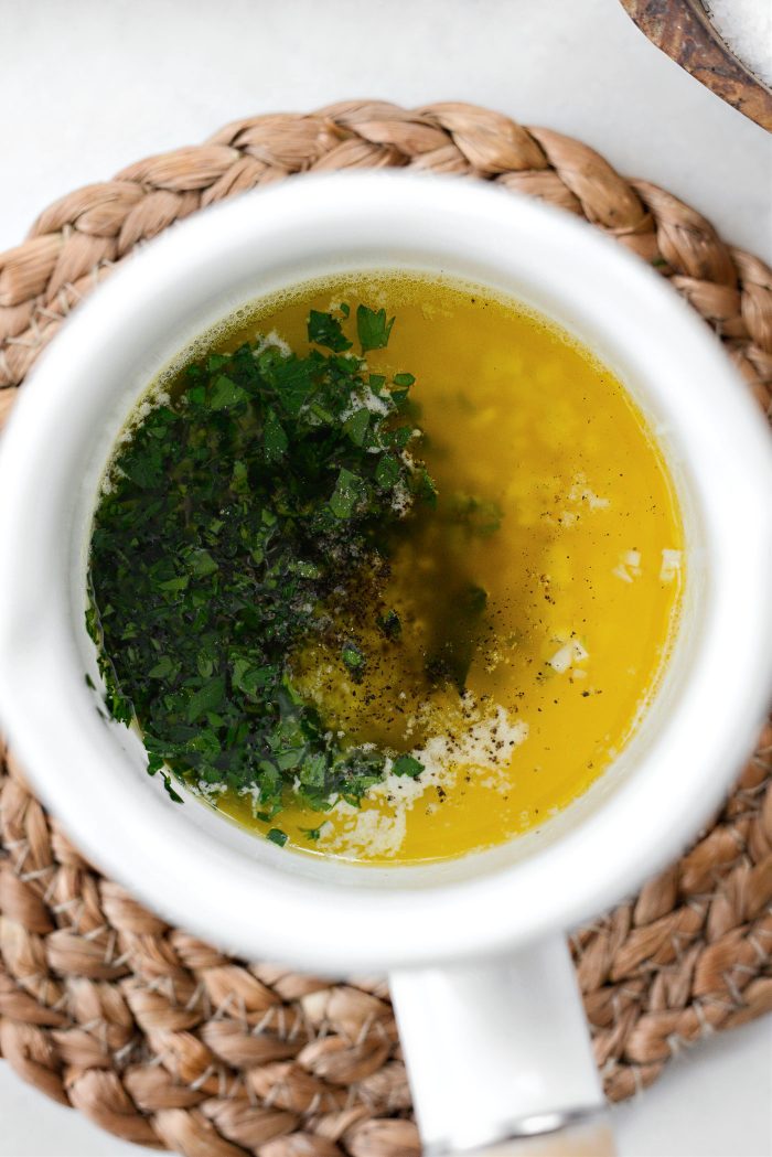 combine melted butter, garlic, parsley, lemon juice, salt and pepper