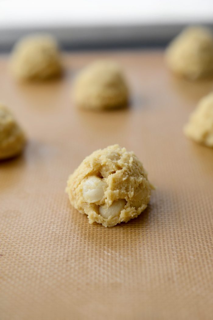 scoop mounds of dough onto prepared baking sheet