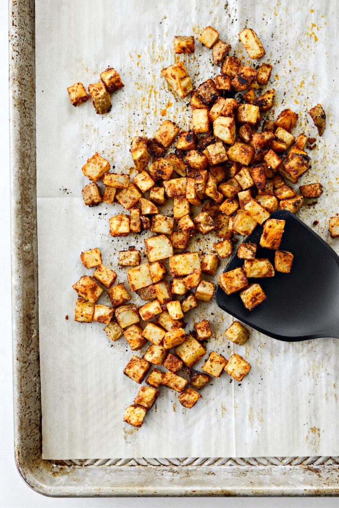 toss potatoes in spices and oil