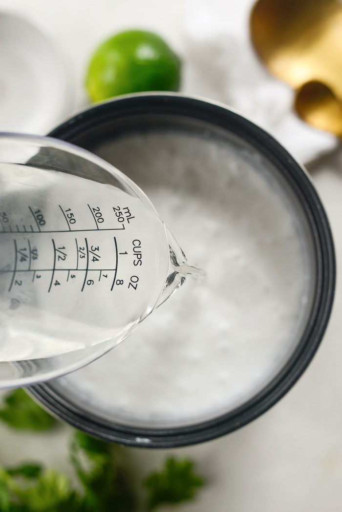 pour in coconut water or regular water