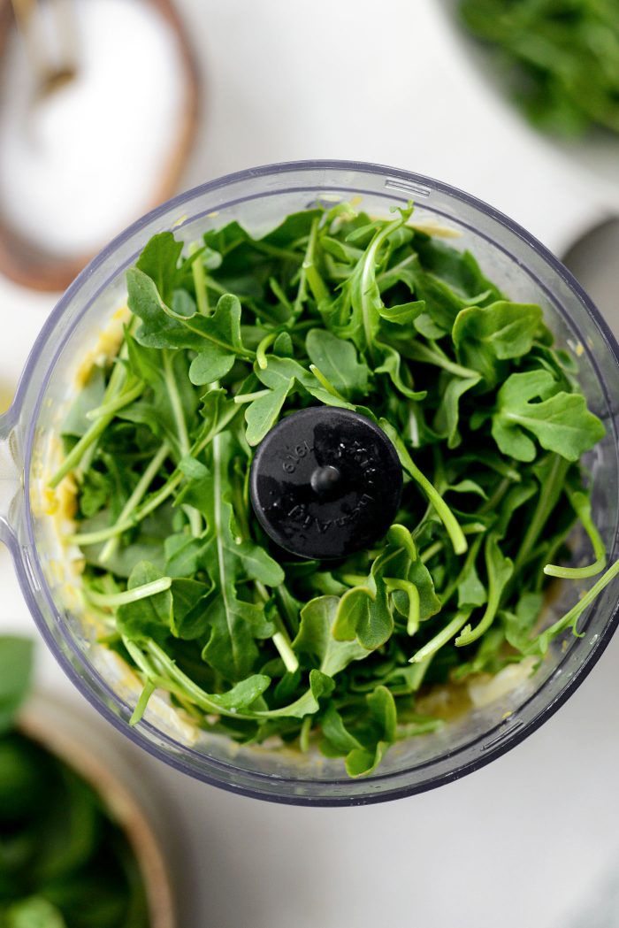 work in batches adding arugula