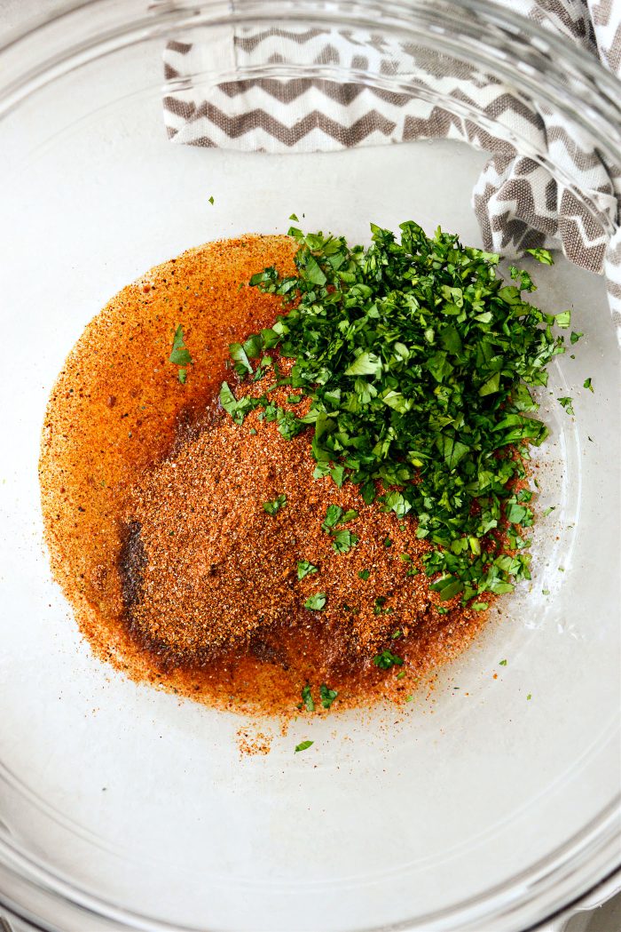 oil, lime juice, street taco seasoning, cilantro in bowl