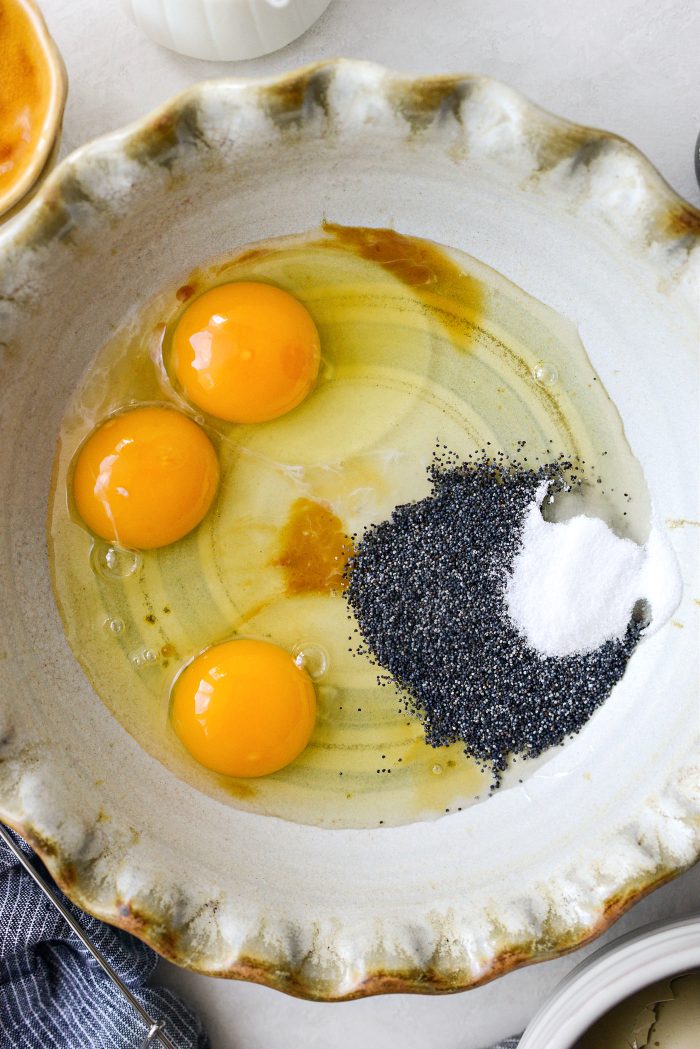 eggs, almond and vanilla extract, poppy seeds and sugar