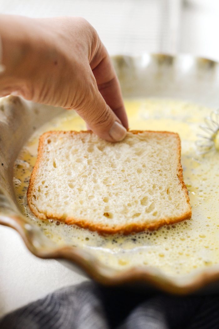dip both sides of the bread